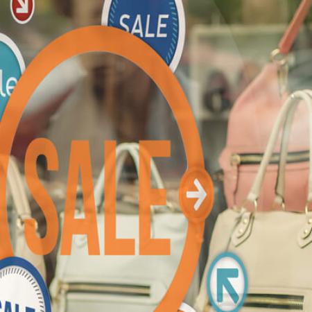 Nekoosa Hi-Stat® static cling vinyl used for a point-of-purchase window decal at a purse boutique.